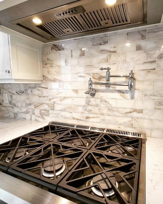 Image showing a kitchen backsplash tile installation services with elegant marble tile in Falls Church, VA.